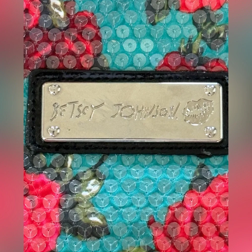 Betsey John turquoise and floral fully clear sequined bag.